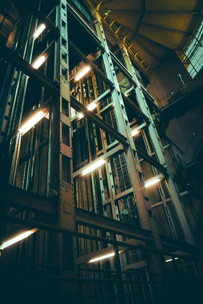 Empty fluorescent-lit corridor representing Liminal Spaces photography collection